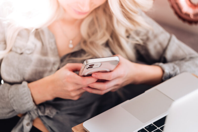 young-woman-using-her-white-smartphone-at-home-picjumbo-com