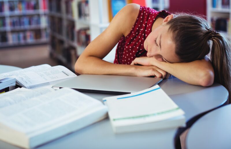 girl_sleeping_on_desk