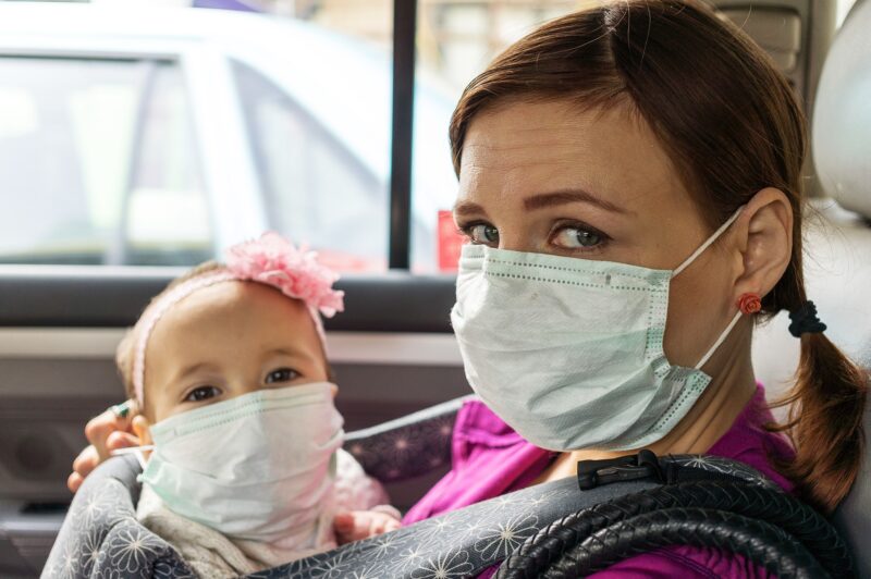 Masked Mother And Baby